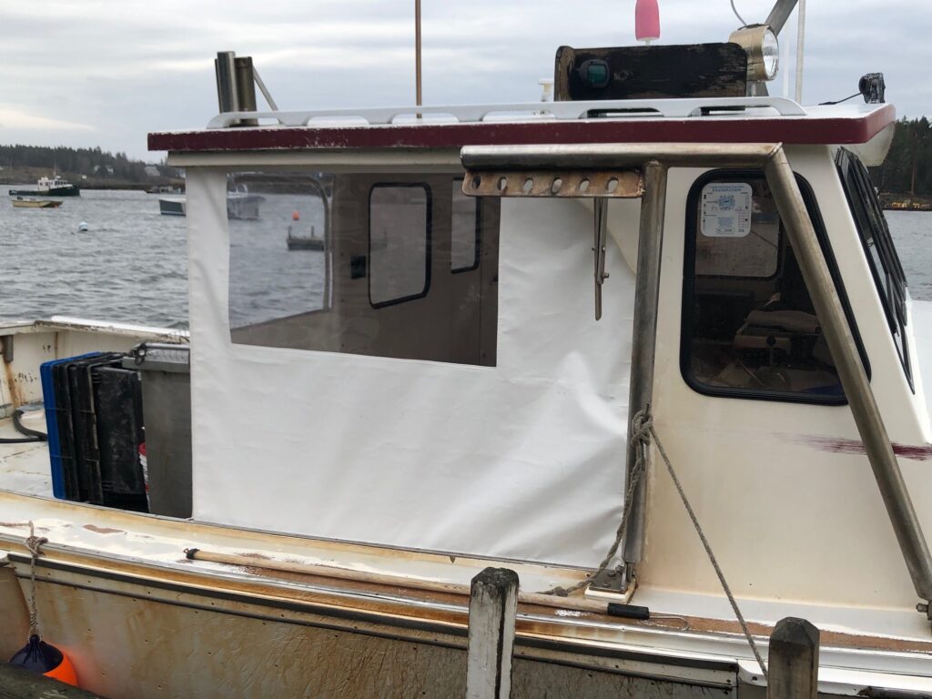 This custom winter back enclosure helps keep the crew warmer when out hauling lobstah